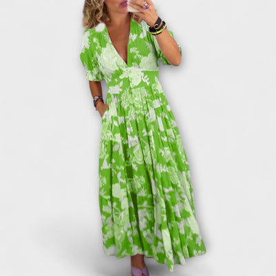 Catrisa – Bloemenprint jurk met V-hals en zakken