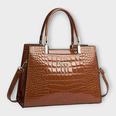 Vivi – Glanzende handtas met krokodillenpatroon