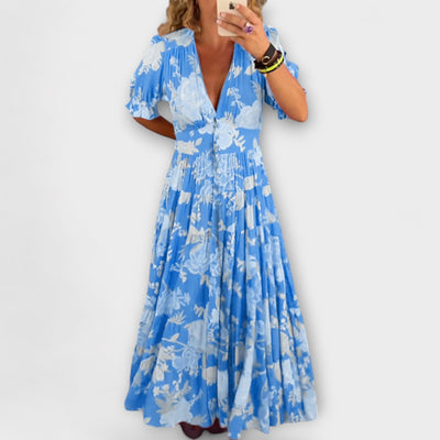 Catrisa – Bloemenprint jurk met V-hals en zakken