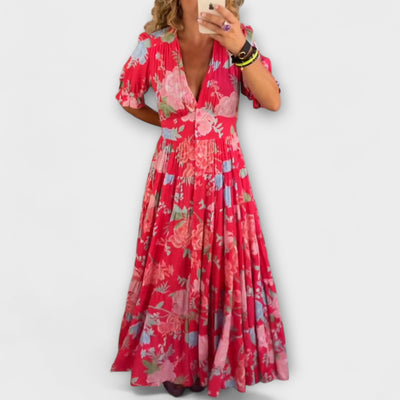 Catrisa – Bloemenprint jurk met V-hals en zakken