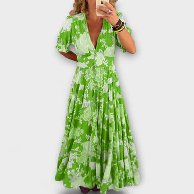 Catrisa – Bloemenprint jurk met V-hals en zakken