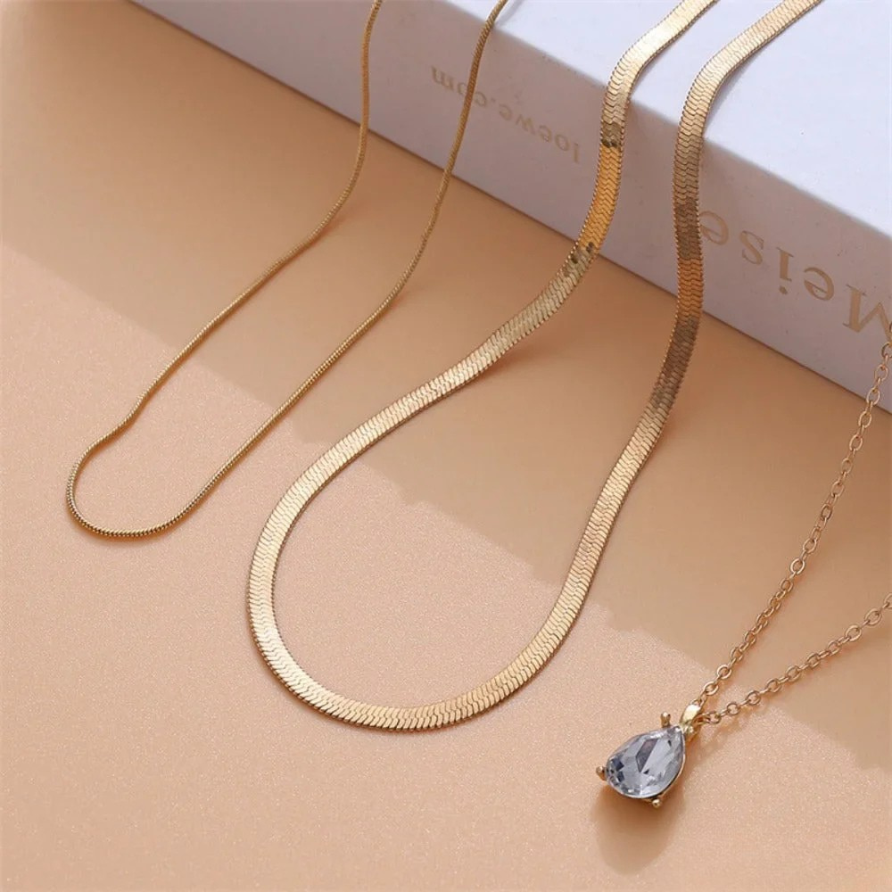 Gelaagde halsketting met gouden zirconia hanger